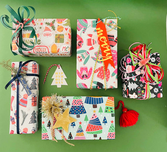 white red and green floral gift wrapper