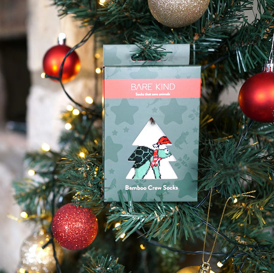 A close up of a christmas tree with ornaments