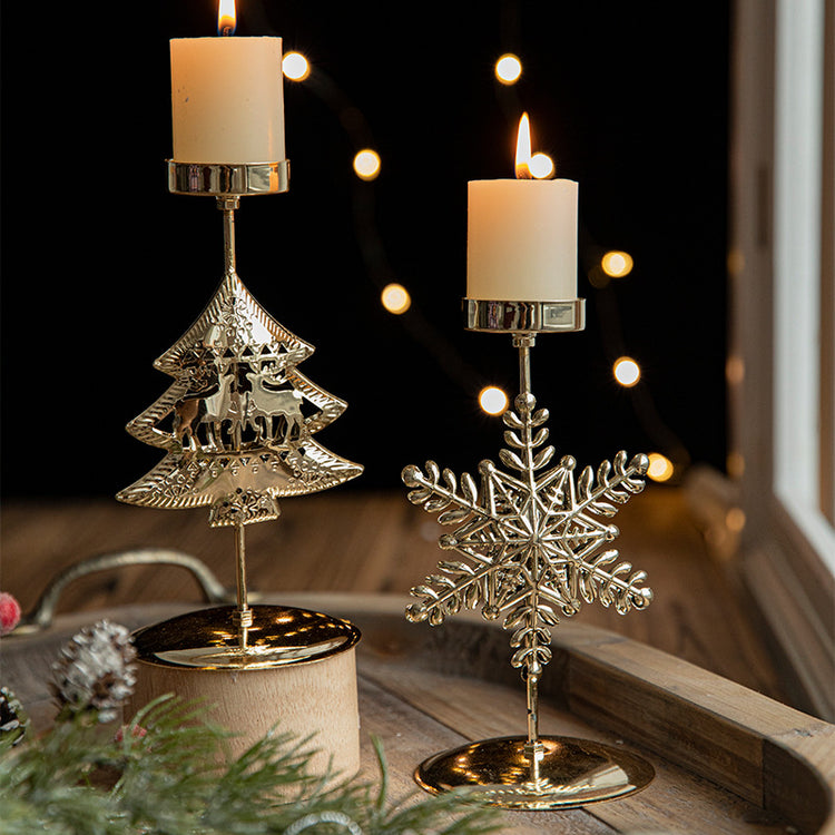 Retro Iron Christmas Candlestick Decorations featuring gold tree and snowflake designs with lit candles.