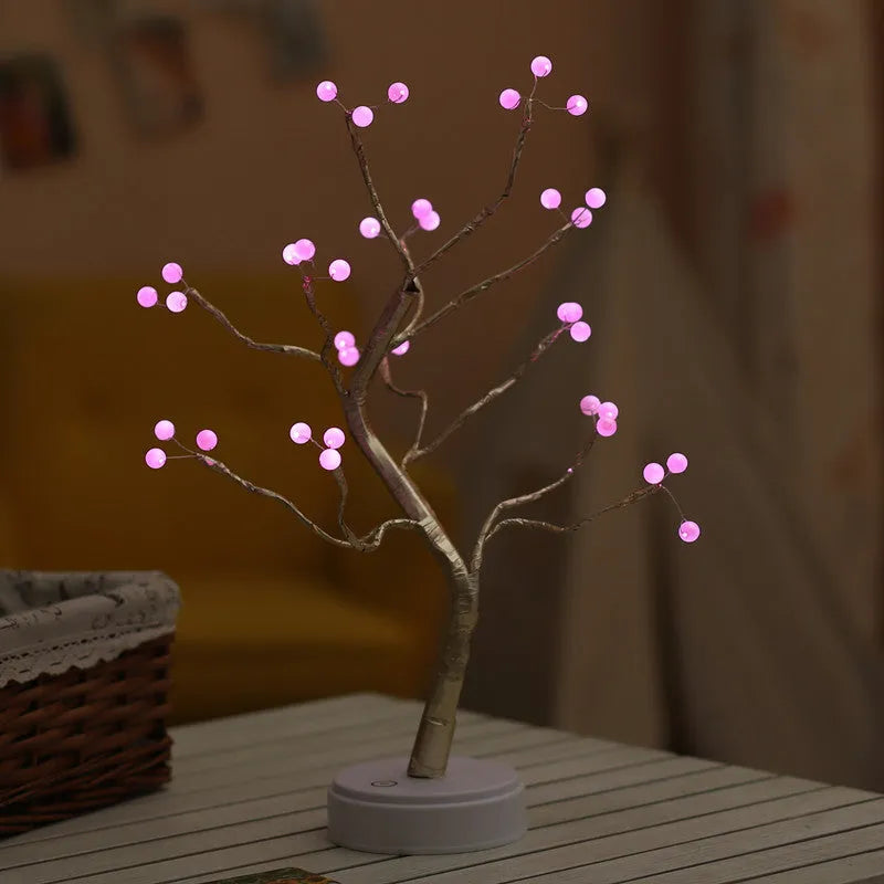 🎄 PearlGlow™ LED Christmas Tree Light with pink glowing pearl bulbs on golden branches, ideal for ambient lighting in home interiors.