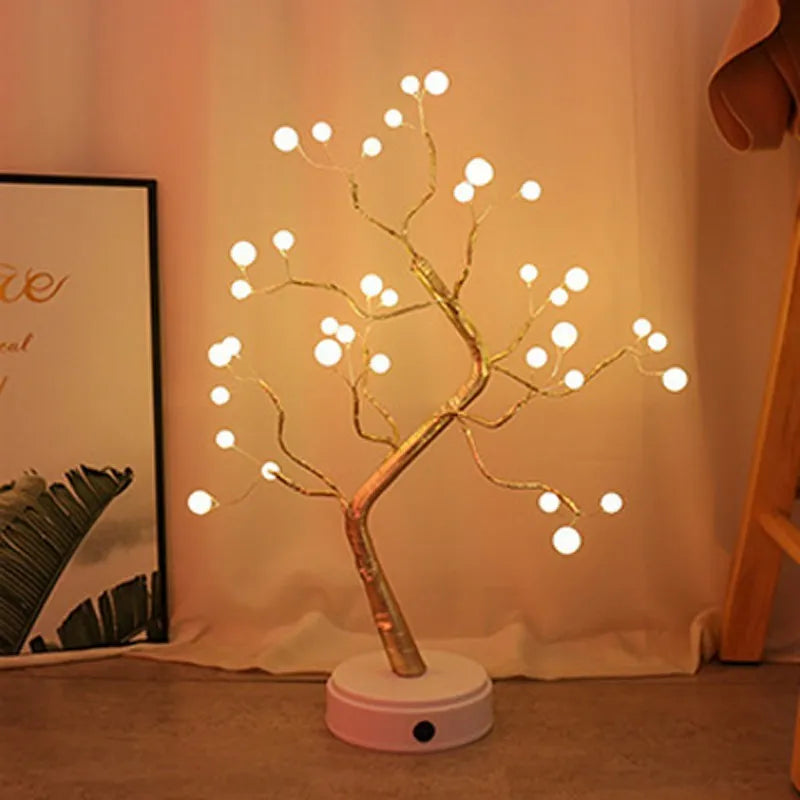 🎄 PearlGlow™ LED Christmas Tree Light with warm white glowing pearl bulbs on golden branches, perfect for cozy holiday ambiance in home décor.