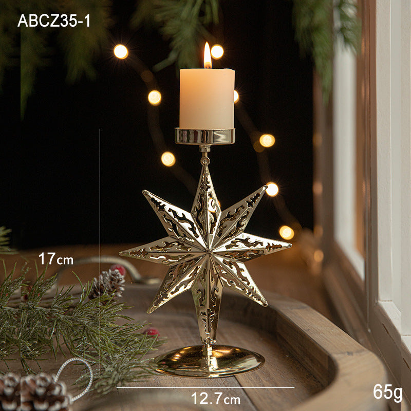 Retro Iron Christmas Candlestick Decorations with star design, featuring a candle on a festive table setting.