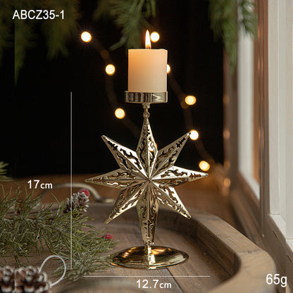 Retro Iron Christmas Candlestick Decorations with star design, featuring a candle on a festive table setting.