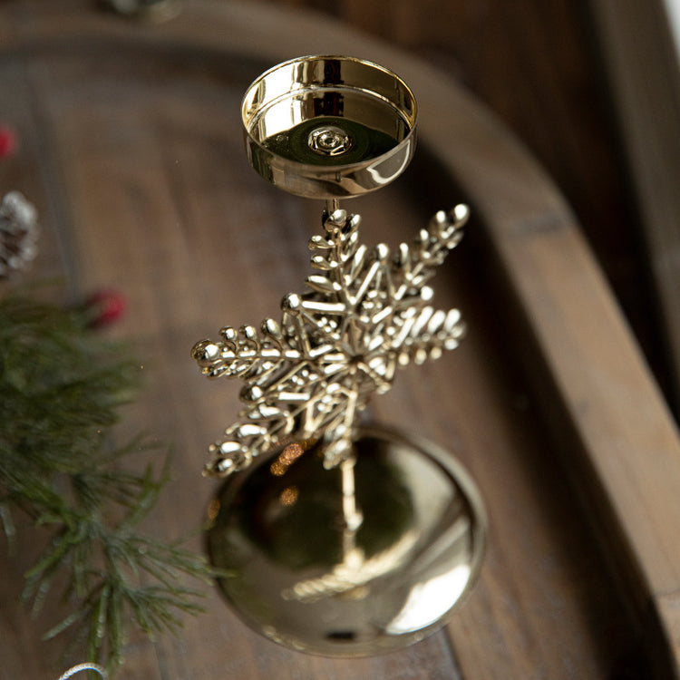 Retro Iron Christmas Candlestick Decorations featuring a gold snowflake design.
